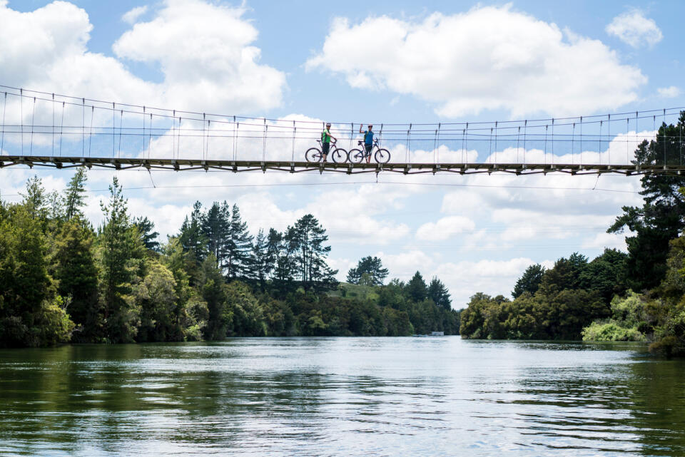 Waikato River Trails Two cyclists on suspension bridge credit Waikato River Trails (1)